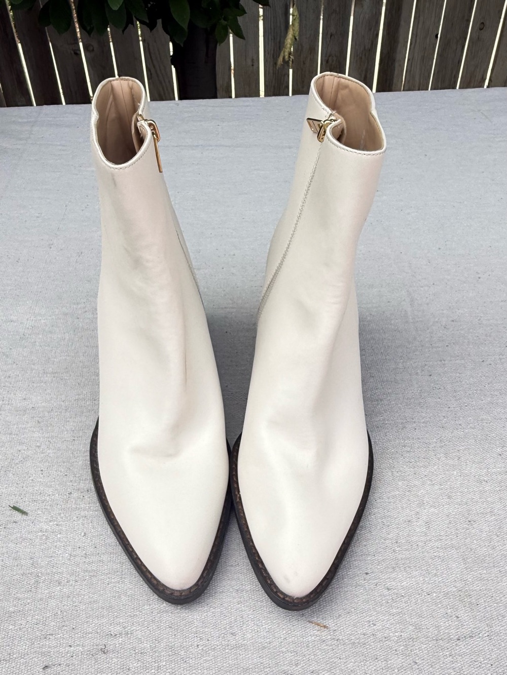 Coach Cream Pointed-Toe Leather Ankle Boots with Gold Zip gold c logo on heel